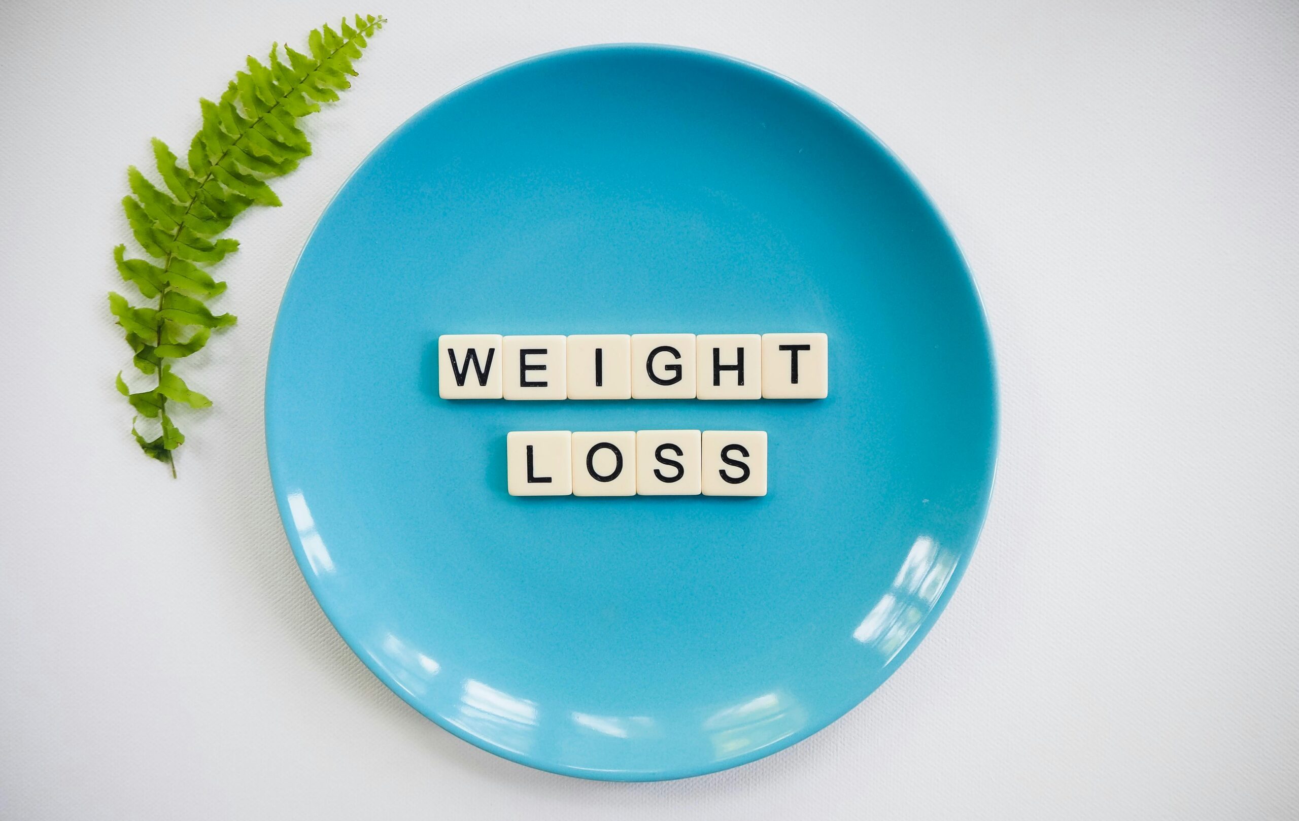 "Weight loss" written on a blue plate